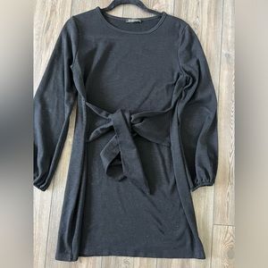 Black figure flattering belted dress